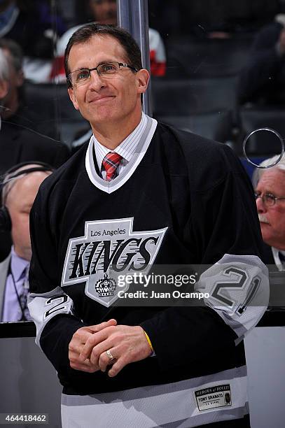 Los Angeles Kings Legend and Detroit Red Wings Assistant Coach Tony Granato stands on the ice during a presentation as part of Legends Night before a...