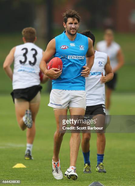 Jarrad Waite of the Kangaroos runs with the ball during a North Melbourne Kangaroos AFL media session at NMFC on February 26, 2015 in Melbourne,...