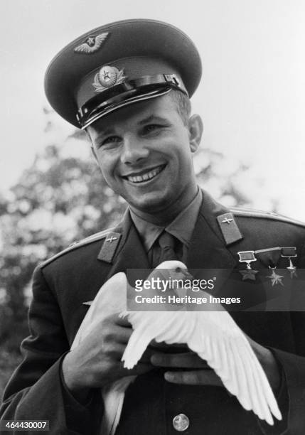 Yuri Gagarin, Russian cosmonaut, c1963-c1964. Gagarin became the first man in space when he orbited the Earth aboard Vostok 1 on 12 April 1961. He...