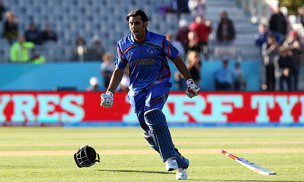 Shapoor Zadran of Afghanistan celebrates their win over Scotland during the 2015 ICC Cricket World Cup match between Afghanistan and Scotland at...