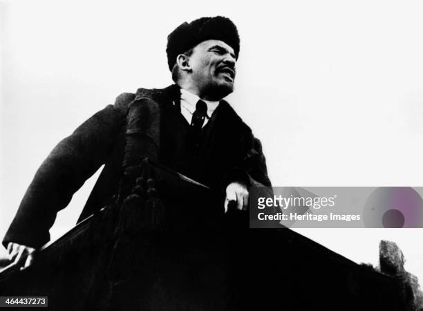 Vladimir Ilich Lenin, Russian Bolshevik revolutionary leader, speaking from a rostrum, 1917. Lenin became leader of the Bolshevik faction of the...
