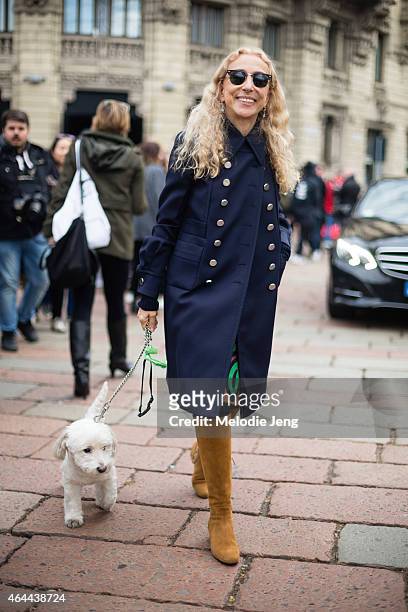 Franca Sozzani, Vogue Italia Editor-In-Chief, exits the Gucci show at Piazza Oberdan with her dog on February 25, 2015 in Milan, Italy.
