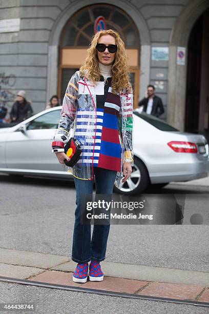 Elina Halimi of Kabuki Paris wears a Topshop jacket, Stella McCartney top, Celine shoes and a Le Petit Joueur bag on February 25, 2015 in Milan,...