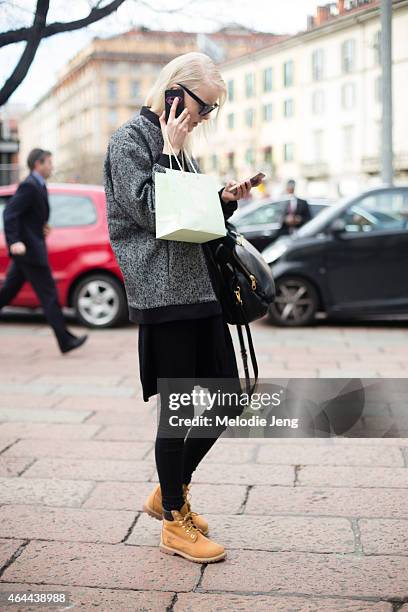 Model Linn Arvidsson exits the Gucci show in Timberland boots on February 25, 2015 in Milan, Italy.