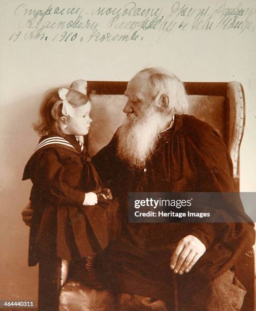 Russian author Leo Tolstoy with his granddaughter Tatiana, Yasnaya Polyana, Russia, c1910. Tolstoy is widely regarded as one of the greatest of all...