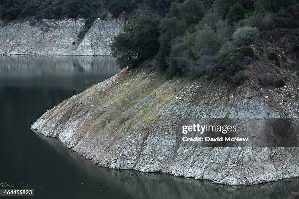 Rocky shores are exposed by the low waters of Morris Reservoir on the San Gabriel River in the Angeles National Forest on January 22, 2014 in near...