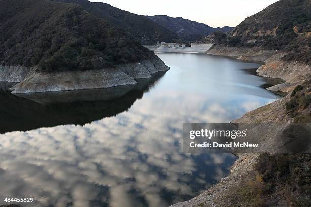 Rocky shores are exposed by the low waters of Morris Reservoir on the San Gabriel River in the Angeles National Forest on January 22, 2014 in near...