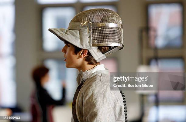 Jacob Hession-Kunz of Concord-Carlisle, practices between bouts at the 8th annual Concord-Carlisle Invitational Fencing Tournament in Concord,...