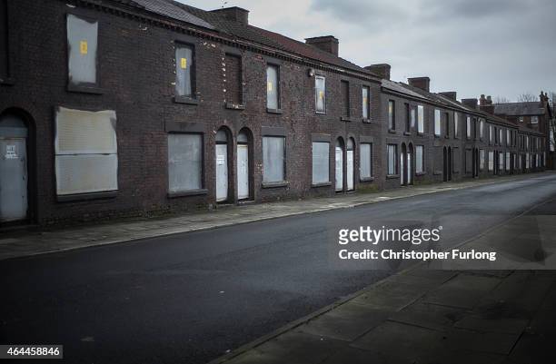 Derelict homes wait for their fate in Toxteth, Liverpool, Local campaigners are calling for the area to be redeveloped and are embroiled in a fight...