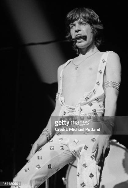 Singer Mick Jagger playing a harmonica on the first night of the Rolling Stones' 1973 European World Tour, Stadthalle, Vienna, Austria, 1st September...
