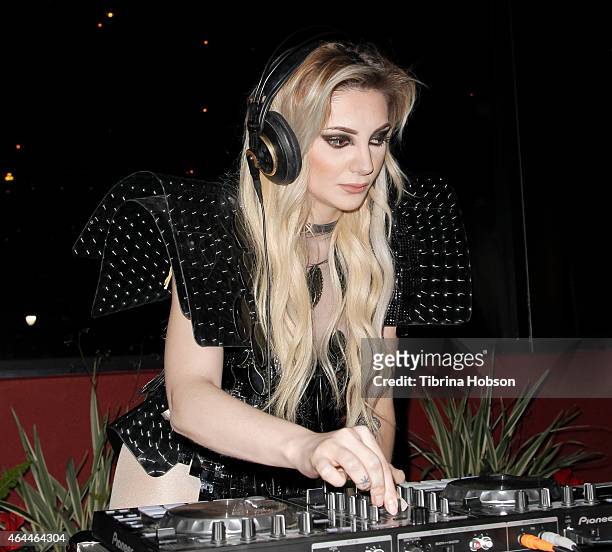 Caroline Burt performs at Victoria Fuller's 'The Beauty Code' art show at The Redbury Hotel on February 25, 2015 in Hollywood, California.