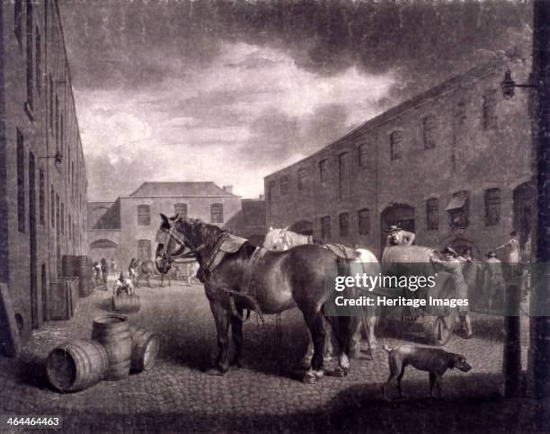 East end of Whitbread's Brewery, Chiswell Street, Islington, London, c1792. Scene in the cobbled courtyard of Whitbread's brewery as workers load...