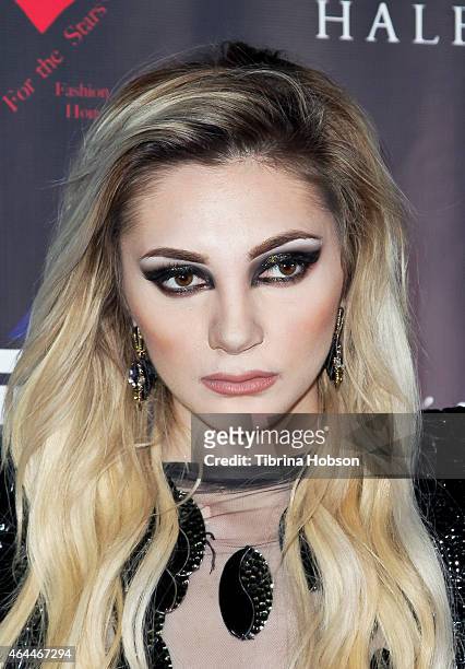 Caroline Burt attends Victoria Fuller's 'The Beauty Code' art show at The Redbury Hotel on February 25, 2015 in Hollywood, California.