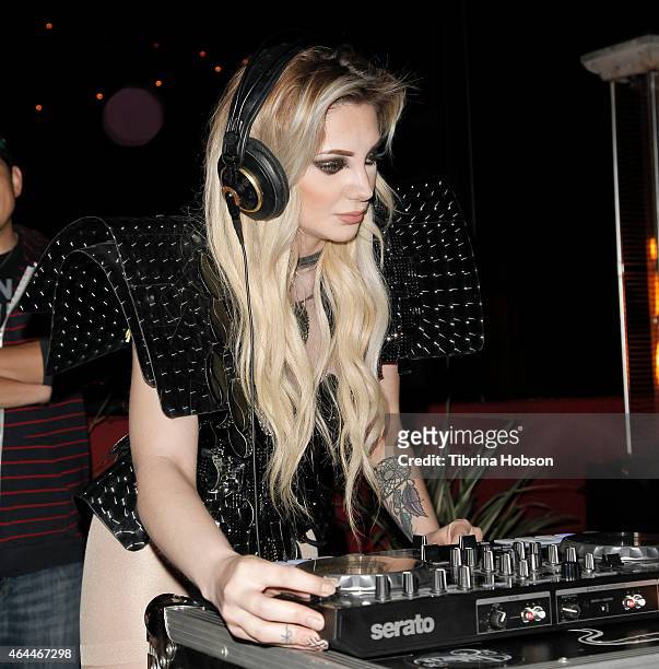 Caroline Burt performs at Victoria Fuller's 'The Beauty Code' art show at The Redbury Hotel on February 25, 2015 in Hollywood, California.