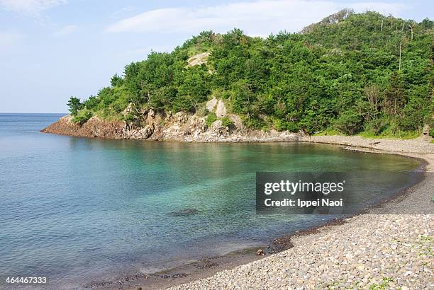 small cove beach with clear calm water, shimane - okinoshima stock pictures, royalty-free photos & images