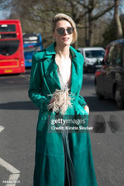 Fashion blogger Sofie Valkiers wears a Burberry coat , Dior sunglasses and a Barbara Bonner bag. On day 4 of London Collections: Women on February...