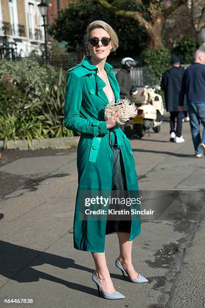 Fashion blogger Sofie Valkiers wears a Burberry coat , Dior sunglasses, Jimmy Choo shoes and a Barbara Bonner bag. On day 4 of London Collections:...