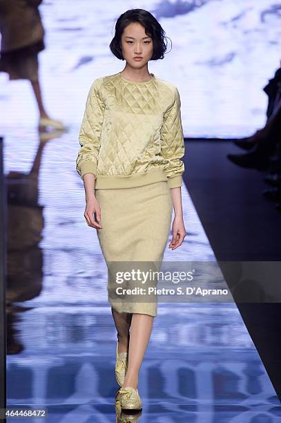 Model walks the runway at the Max Mara show during the Milan Fashion Week Autumn/Winter 2015 on February 26, 2015 in Milan, Italy.