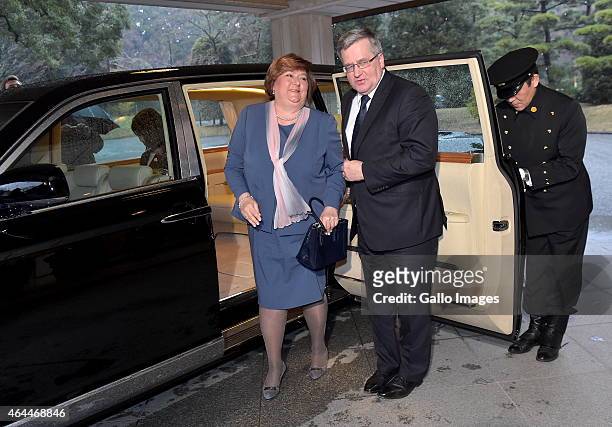 TLady Anna Komorowska and President Komorowski step out of the limousine to meet The Emperor Akihito and Empress Michiko of Japan on February 26,...