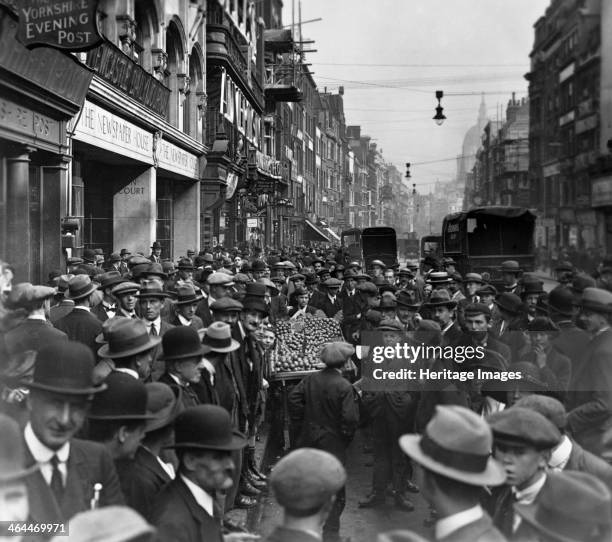 Crowd outside the Newspaper House, Fleet St looking east, City of London, before 1933. St Paul's Cathedral can be seen on the far-right. Reid, an...