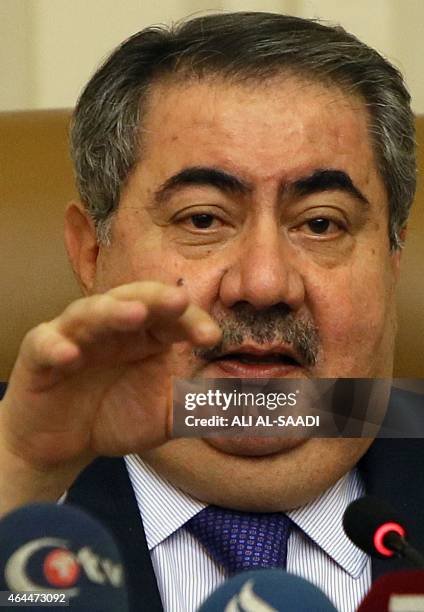 Iraqi Finance Minister Hoshyar Zebari speaks during a press conference during which he is expected to address the contentious issue of revenue...