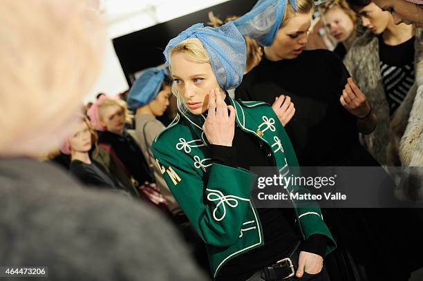 Models are seen backstage ahead of the Max Mara show during the Milan Fashion Week Autumn/Winter 2015 on February 26, 2015 in Milan, Italy.