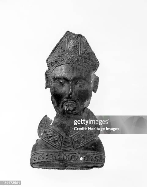 Pilgrim badge in the shape of St Thomas Becket's head, second half of the 14th century. Becket, the archbishop of Canterbury, was murdered in...