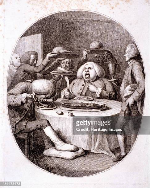 The alderman's dinner, 1775. An obese alderman eats gluttonously; his slimmer companion, bent over a plate, evidently suffers from gout as his...