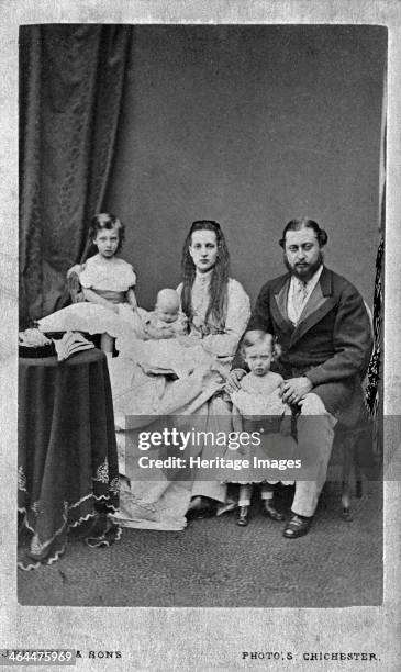 The Prince and Princess of Wales with their children Prince Albert Victor, Prince George and Princess Louisa.