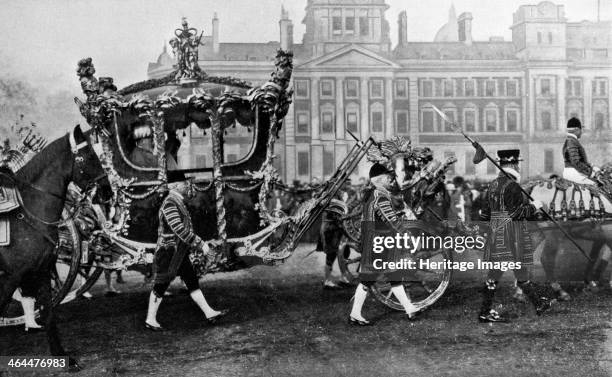 King Edward VII in his coronation coach, 1902. The Gold State Coach was first used to carry King William IV to his coronation in 1831. It has been...