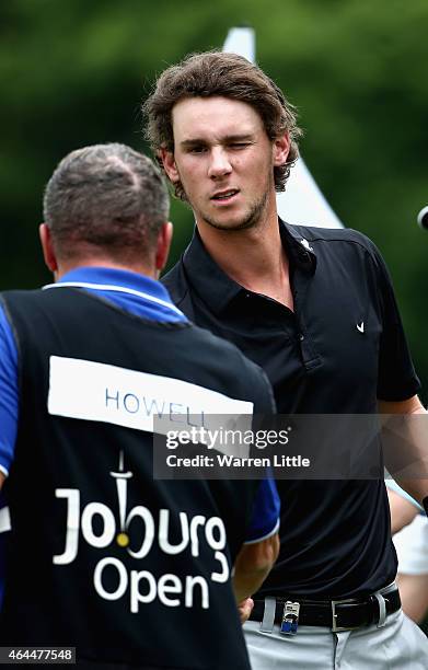 Thomas Pieters of Belgium shakes hands with playing partners on the 18th green during the first round of the Joburg Open at Royal Johannesburg and...