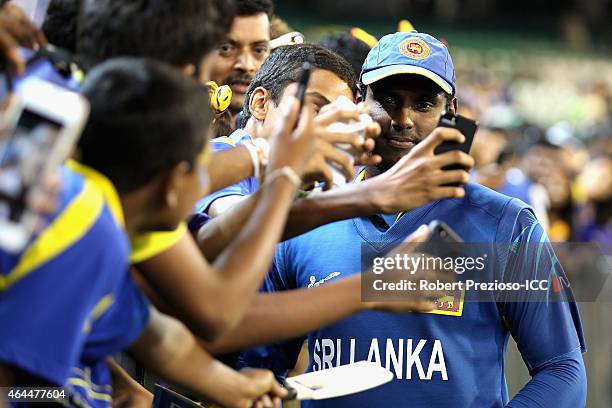 Angelo Mathews of Sri Lanka poses for fans during the 2015 ICC Cricket World Cup match between Sri Lanka and Bangladesh at Melbourne Cricket Ground...