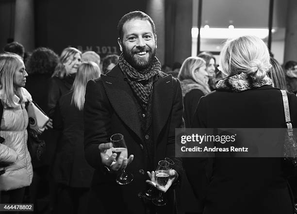 Guest attends the 'Marie Claire Loves Art, Celebrating 20 Italian Artists' Exhibition Opening on February 25, 2015 in Milan, Italy.