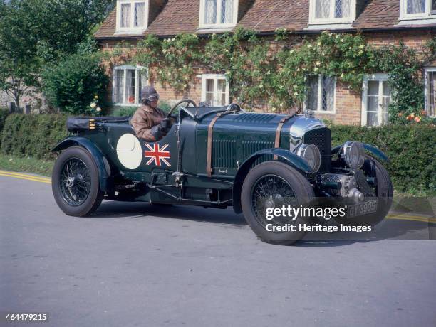 Bentley 4.5 litre Supercharged. Early Bentley outside a cottage; the driver wears gloves and goggles. WO Bentley built his first sports car, a 3...