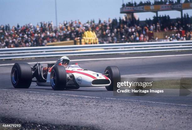 John Surtees driving a Honda, Spanish Grand Prix, Jarama, 1968. He failed to finish the race, retiring after 74 laps with a gear linkage problem....