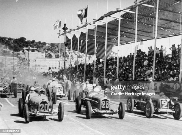 The starting grid for the Nice Grand Prix, 1934. Rene Dreyfus is in car 20, a Bugatti 59. Achille Varzi is in car 28, an Alfa Romeo Tipo B P3. Tazio...