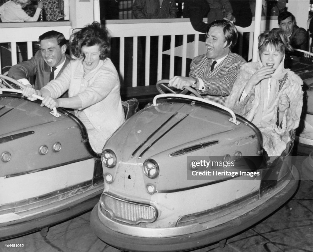 Graham Hill and Jim Clark on Dodgem cars at Butlins, Bognor Regis, 1960s.