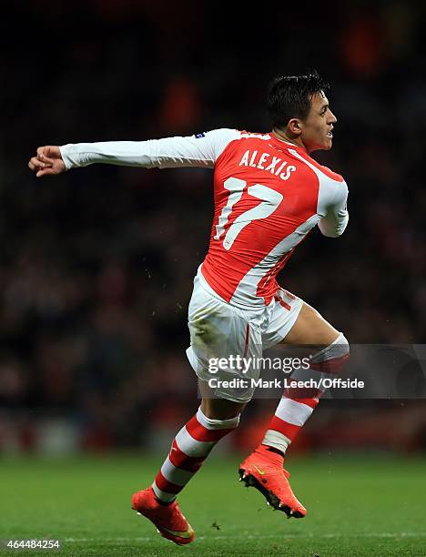 Alexis Sanchez of Arsenal shoots during the UEFA Champions League round of 16, first leg match between Arsenal and Monaco at The Emirates Stadium on...