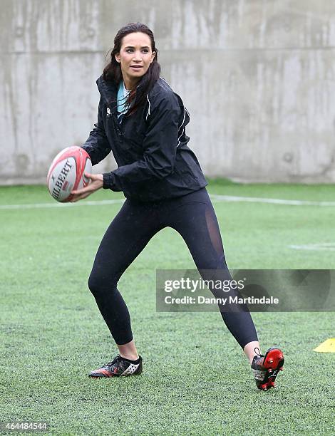 Sporting Soprano Laura Wright attends the Evelyn Grace Academy school as part of the All Schools Rugby campaign where she played rugby and performed...
