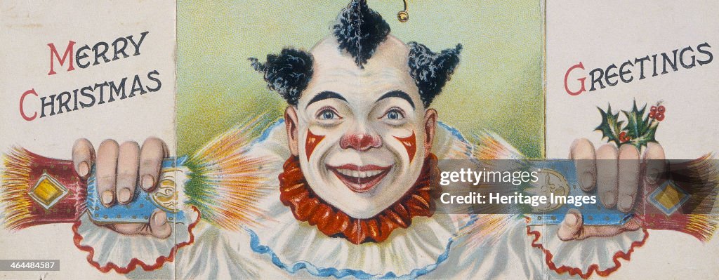 Christmas card; clown pulling a cracker, early 20th century.