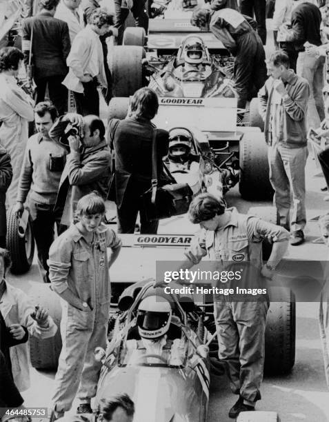 Starting Grid, British Grand Prix, Silverstone, Northamptonshire, 1971. From front to back; Tim Schenken , Graham Hill , Jackie Stewart , their cars...