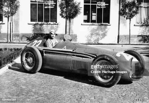 Fangio in Alfa Romeo, prior to the San Remo Grand Prix, Italy, 1950. Juan Manuel Fangio won the race, his first at the wheel of an Alfa Romeo. In his...