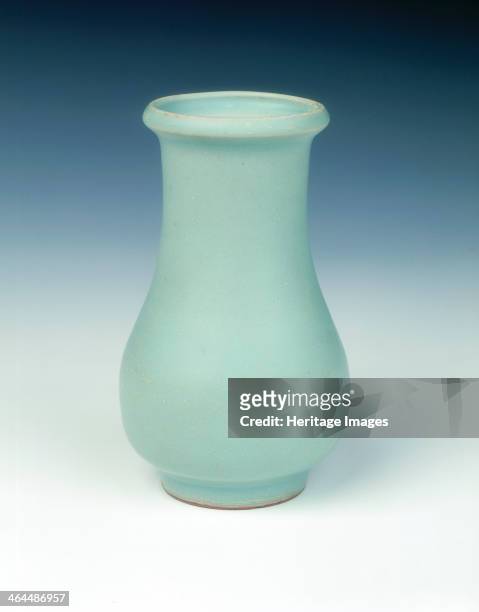 Longquan celadon vase, Southern Song dynasty, China, late 12th century. A small, plain celadon vase of pear shape with wide-shaped mouth. The body...
