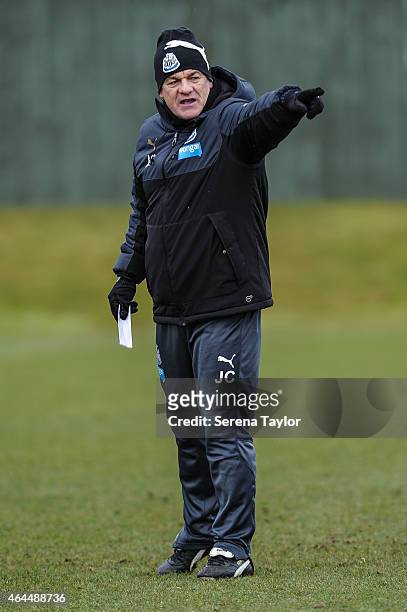 Head Coach John Carver points instructions whilst standing on the training pitch during a Newcastle United Training session at The Newcastle United...