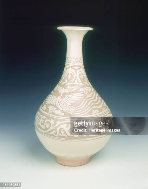 Cizhou type sgraffito Yuhuchun vase with two phoenixes, early Yuan dynasty, China, late 13th-early 14th century. A Cizhou stoneware pear-shaped vase...