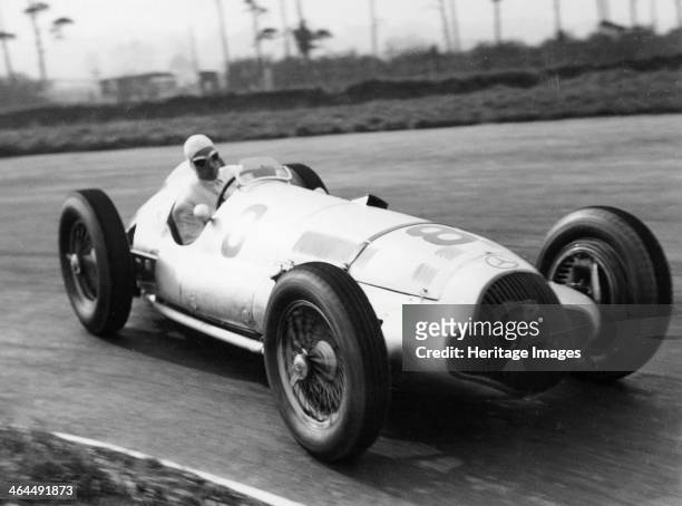 Dick Seaman's Mercedes, Donington Grand Prix, 1938. He finished third in the race. Seaman began his racing career driving a Bugatti in 1933. He won...