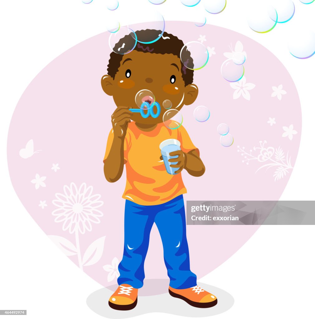 Teenage Boy Blowing Bubbles in Spring