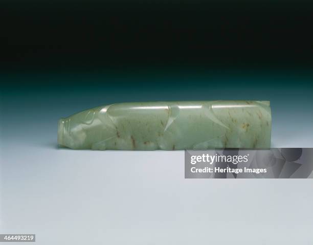 Stylised jade pig, Han dynasty, China, 206 BC-220. A plain stylised jade pig, the jade is of glassy pale celadon green colour. The cutting has been...