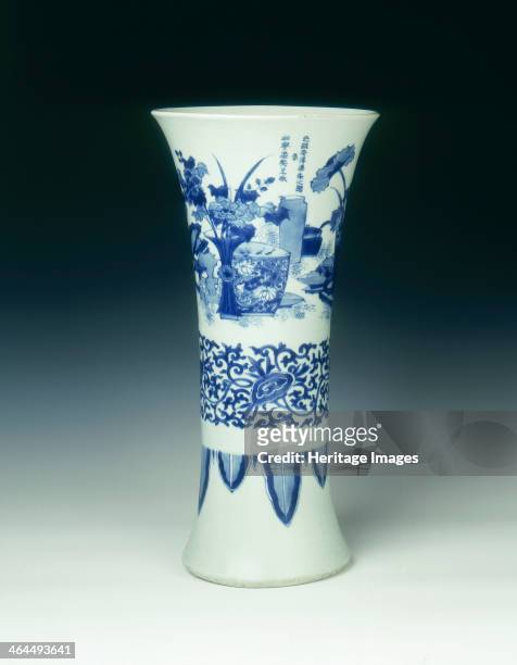 Blue and white trumpet vase, China, 1639. Transitional period large vase decorated in the top section with various vases, fish bowls with fish, and...