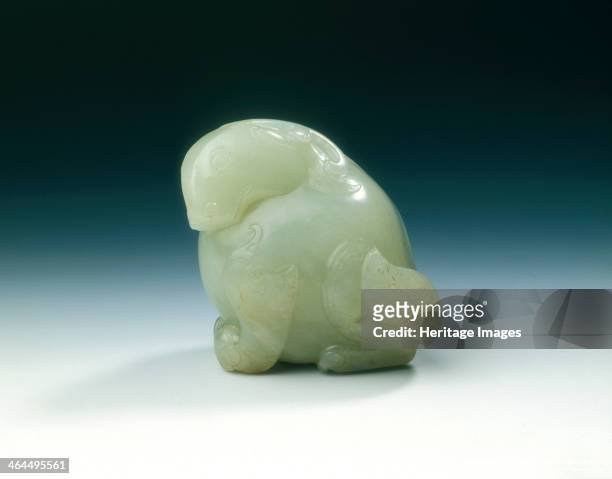 Jade standing mythical animal, Song or early Yuan dynasty, China, 11th-13th century. A mythical animal with bifurcated horns, ears and trifurcated...